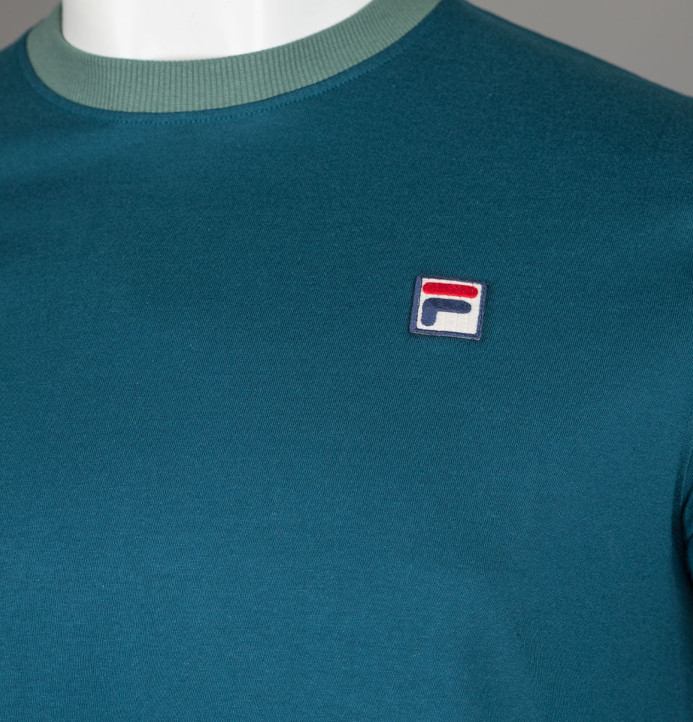 Dark green fila store shirt