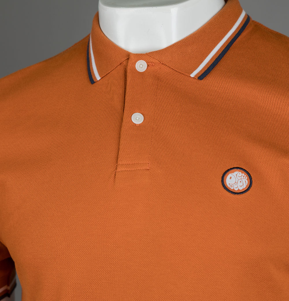 Pretty green shop orange polo shirt